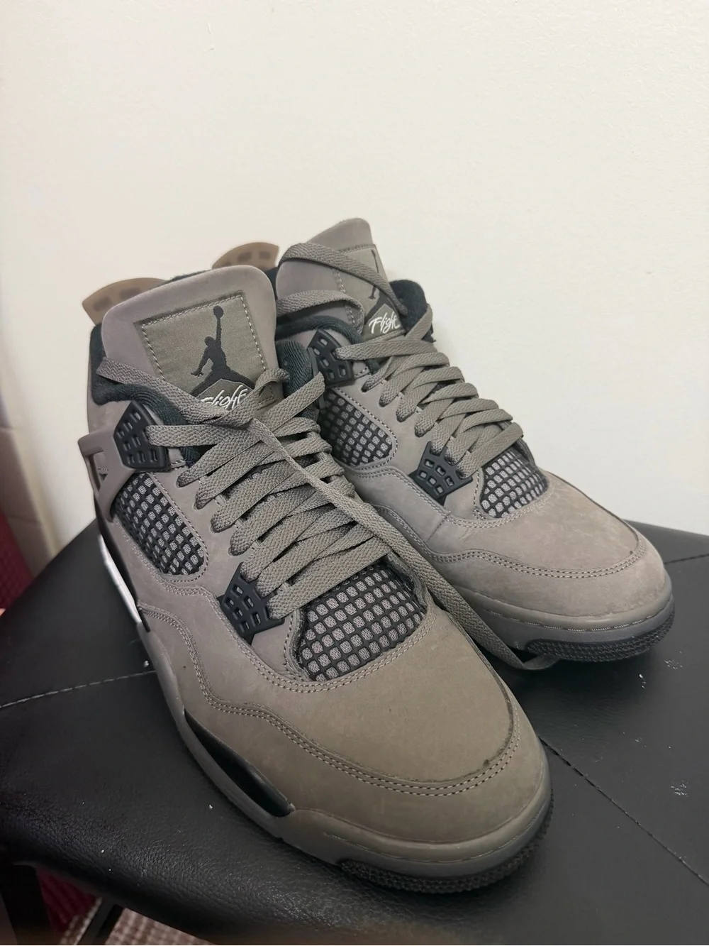 Jordan Retro 4 Sneakers in Grey and Black